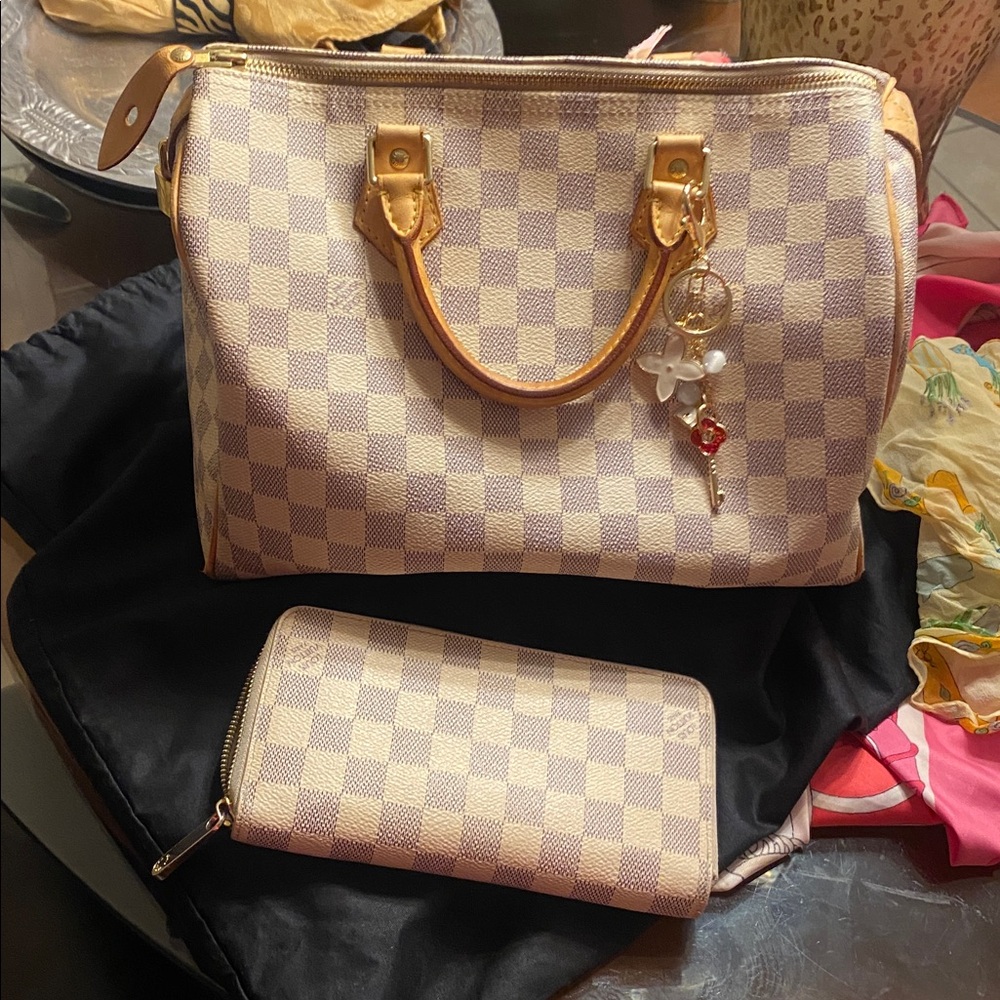 Louis Vuitton Checkered Cream and Tan Bag 
wallet lv and brand new lock key